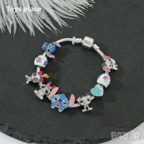 Гривна с талисмани тип Pandora Лило и Стич Lilo and Stitch  →
		Обява 50664782