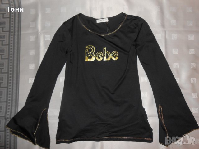 Интересна блуза на bebe san francisco, снимка 1 - Корсети, бюстиета, топове - 18429003