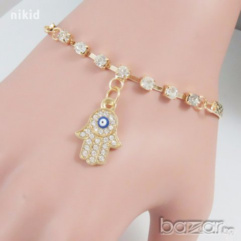 златиста гривна с хамса ръката на Фатима и око против уроки с камъчета