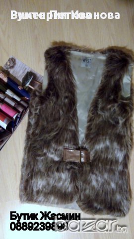 Пухкав бежов елек, снимка 1