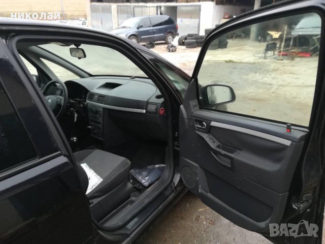 Opel Meriva 1,3 CDTI, снимка 11 - Автомобили и джипове - 23435687