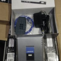 Телефонен адаптер /отключен/- LINKSYS Cisco-VoIP Phone adapter - PAP2-NA, снимка 1 - Мрежови адаптери - 20274264