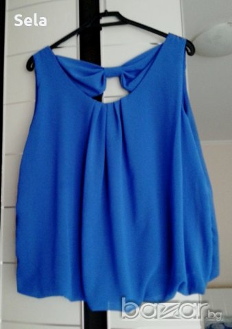 Актуален, красив топ с интересен гръб