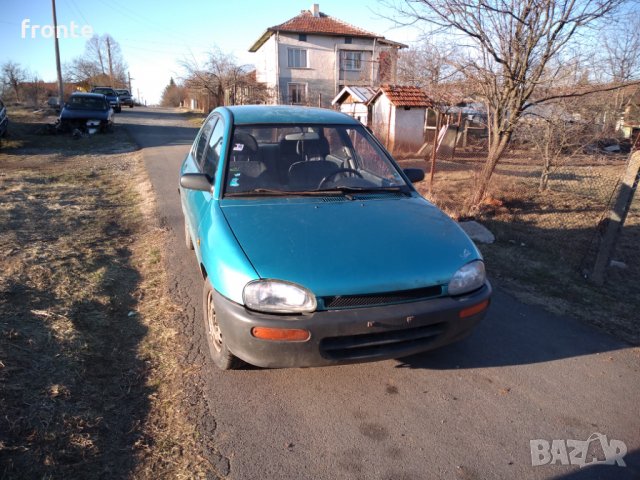 Mazda 121, снимка 7 - Автомобили и джипове - 11729604