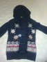 Бенетон страхотна вълнена жилетка , снимка 1 - Детски пуловери и жилетки - 24100197