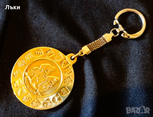 Бронзов ключодържател с велосипедисти.  