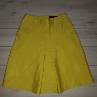 Жълта пола с джобове марка Reserved, снимка 1 - Поли - 24023479