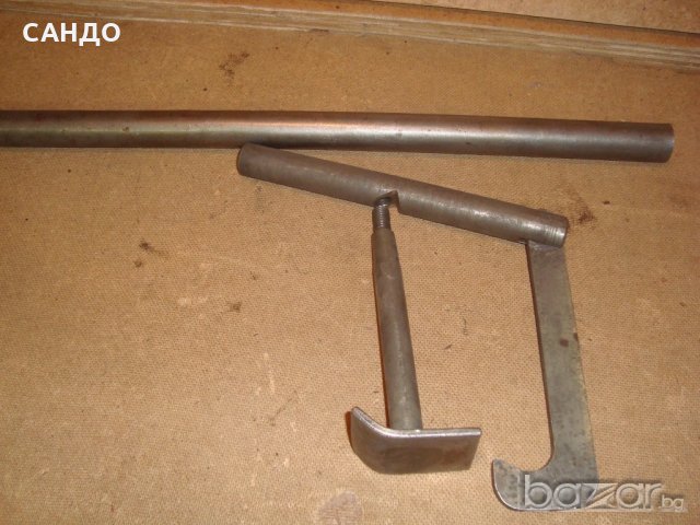 Приспособление за разлепване на гуми от джантите