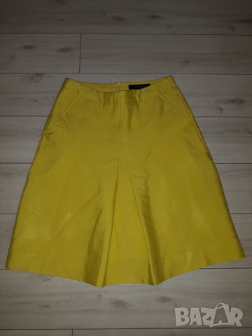 Жълта пола с джобове марка Reserved