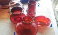 Червено стъклени красоти ваза, котле, пепелник от един сет