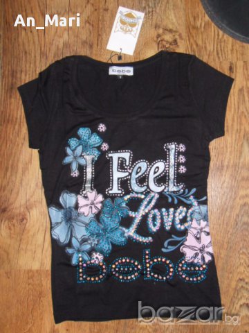 "Bebe" Дамска блузка в черно на цветя, снимка 1 - Тениски - 17509456