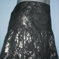 Зашеметяваща дизайнерска пола "Units" в сребрист флорален принт, снимка 1 - Поли - 14585414