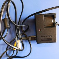 Зарядно устройство за фотоапарат olympus li-40c, снимка 1 - Батерии, зарядни - 23994694