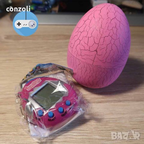Тамагочи играчка в динозавърско яйце, снимка 6 - Други игри и конзоли - 24007950