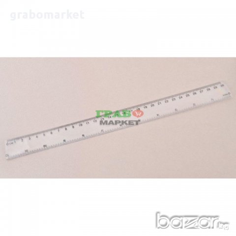 Прозрачна линия, оразмерена в инчове и сантиметри. Изработена от PVC материал. Дължина - 30 см