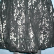 Зашеметяваща дизайнерска пола "Units" в сребрист флорален принт, снимка 8 - Поли - 14585414