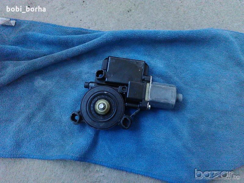 моторче за машинка за лява шофьорска врата за поло 2010г., снимка 1