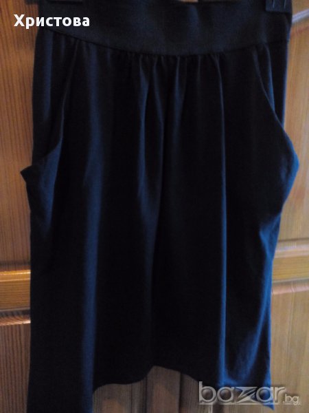 Къса черна асиметрична пола от трико с набор и джобове., снимка 1