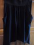 Къса черна асиметрична пола от трико с набор и джобове., снимка 1 - Поли - 14471845