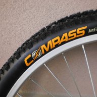 Продавам колела внос от Германия  НОВИ външни гуми COMPASS ANTI-PUNCTURE 26 х 1,95 , снимка 1 - Части за велосипеди - 14285966