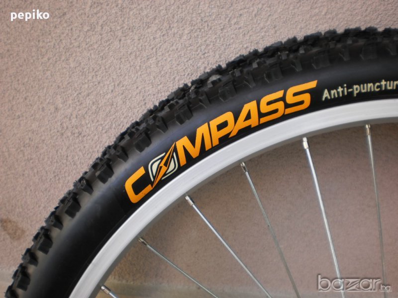 Продавам колела внос от Германия  НОВИ външни гуми COMPASS ANTI-PUNCTURE 26 х 1,95 , снимка 1