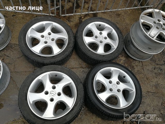 Mazda 2 оригинални джанти 15-ски с летни гуми Bridgestone, снимка 5 - Гуми и джанти - 20953443
