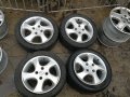 Mazda 2 оригинални джанти 15-ски с летни гуми Bridgestone, снимка 5