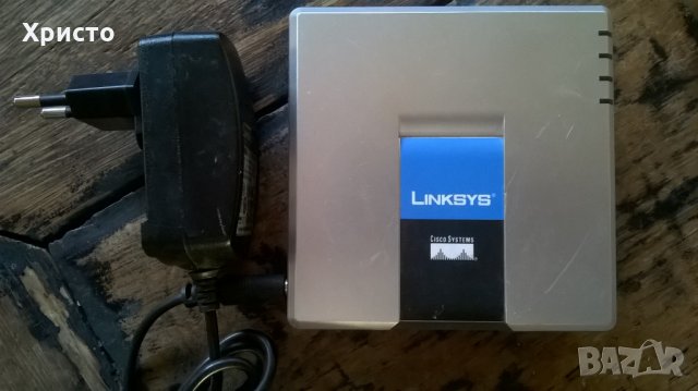 телефонен адаптер Linksys РАР2Т, снимка 1 - Резервни части за телефони - 23210529