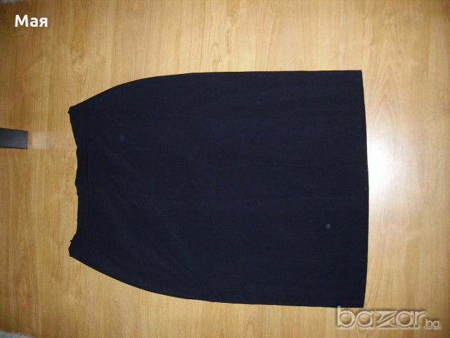 Елегантна дамска права черна пола с плоха отзад 25 лв.