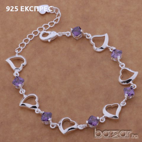 Сребърна гривна със сърца и лилави циркони