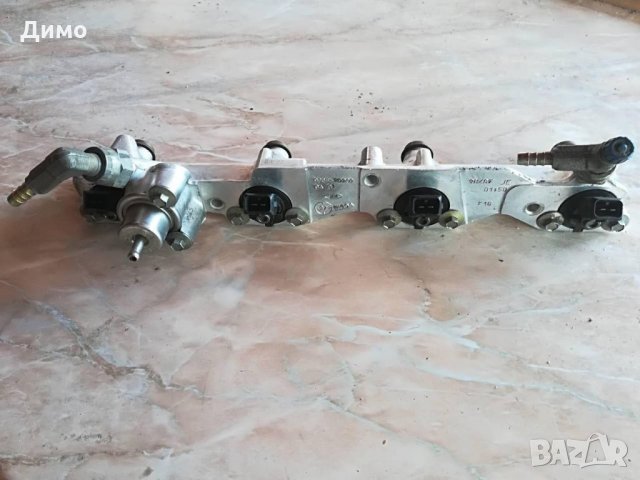 Бензинова рейка с дюзи инжектори за Ford Escort(Форд Ескорт) 1.6i 16v, снимка 1 - Части - 21742215