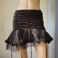 Нова ефектна кафява дамска пола, поръбена с естествена заешка кожа с косъм (тип "туту"), рокля,заек, снимка 1 - Поли - 8730064