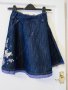 Next страхотна дънкова пола с бродерии за 7 год , снимка 1 - Детски рокли и поли - 11338560