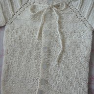 Нова ръчно плетена жилетка - ръст до 92 см, снимка 9 - Жилетки и елечета за бебе - 12341273