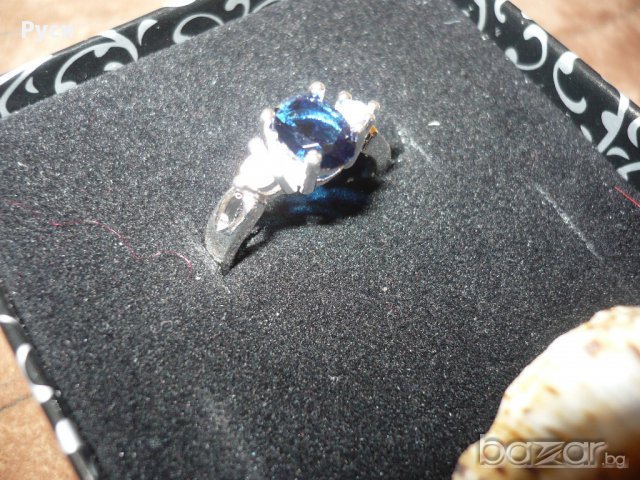 Пръстен сребърно покритие със син кристал