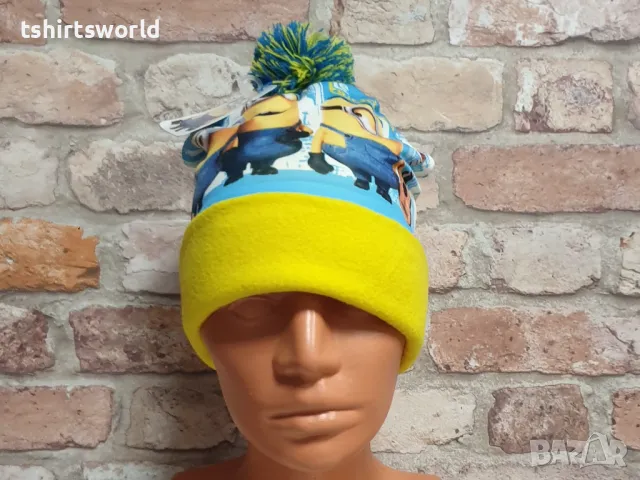 Нова детска зимна шапка с Миньони с помпон, снимка 8 - Шапки, шалове и ръкавици - 47894352