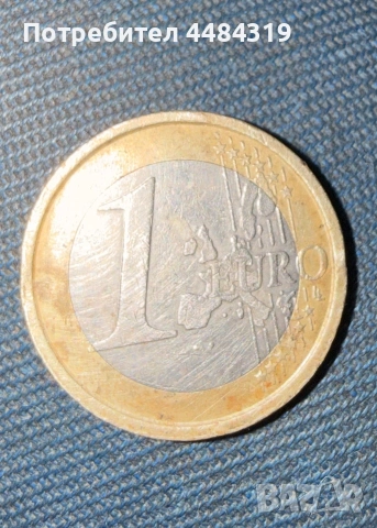 Италианска монета от 1 евро 2002г. Ветрувианският човек на да Винчи