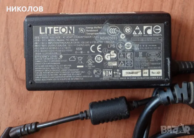зарядно за лаптоп, снимка 2 - Захранвания и кутии - 48441453