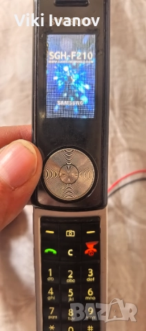 Самсунг F210