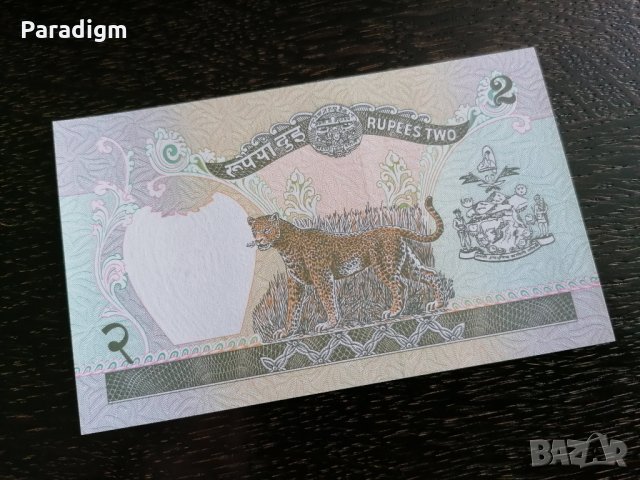 Банкнота - Непал - 2 рупии UNC | 1981г., снимка 2 - Нумизматика и бонистика - 29365452
