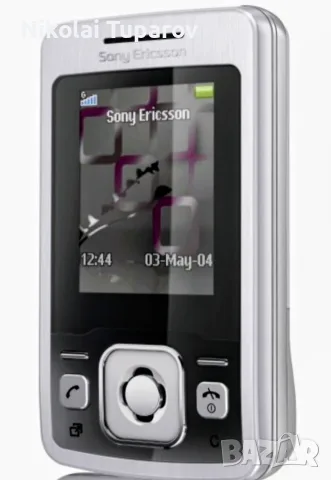 Работещ телефон Sony Ericsson T303 слайдър дисплей свети в синьо зарядно устройство 