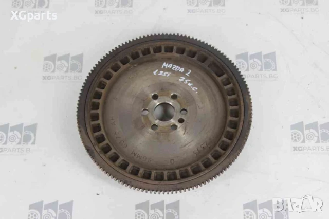 Маховик за Mazda 2 1.2i / 1.25i 75 к.с. (2003-2007), снимка 2 - Части - 50733900