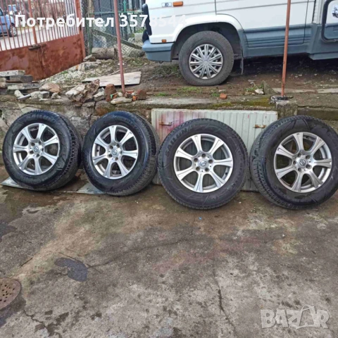 Гуми с джанти Нисан 215/70/16