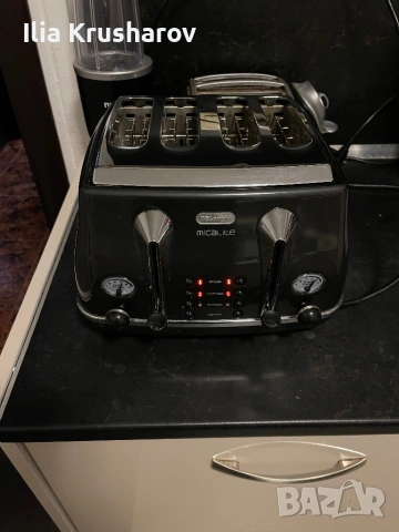 Тостер Delonghi