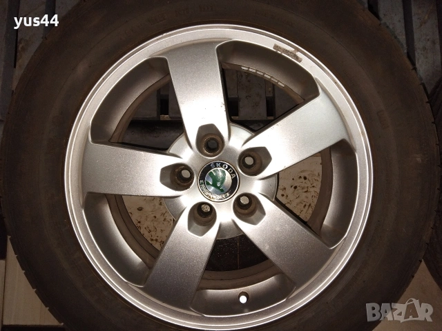 Алуминиеви джанти и гуми 15 оригинални Шкода Октавия, снимка 6 - Гуми и джанти - 53215012