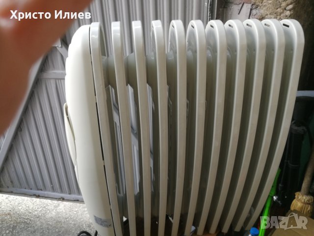 Електрически маслен радиатор Grunkel 2300 W с 3 степени, снимка 12 - Отоплителни печки - 42699061