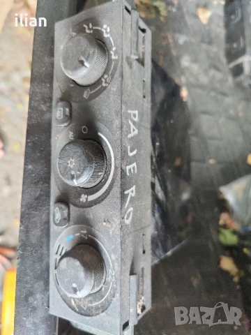 управление климатик pajero