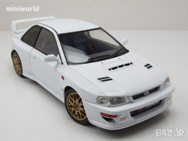 Subaru Impreza 22B 1998 - мащаб 1:18 на Solido моделът е нов в кутия, снимка 9 - Колекции - 44474303