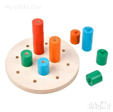 Дървената дъска за подреждане на колчета – Peg board