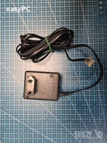 Оригинален захранващ адаптер THOMSON TELECOM MHH41-01-01 6.5VDC 50mA 9VAC 50mA , снимка 4 - Друга електроника - 48282100